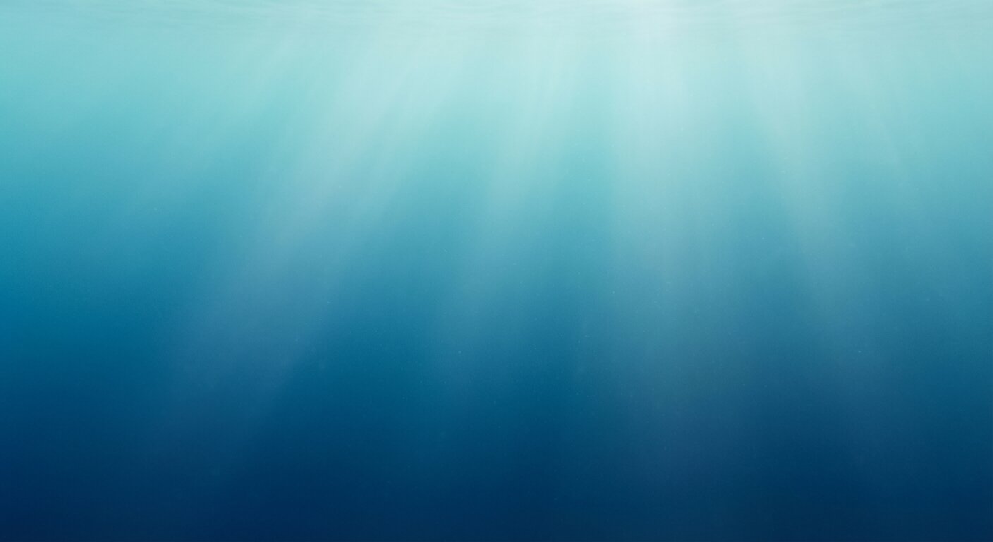 Underwater scene with sunlight filtering through clear blue water